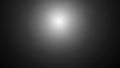 Soft focus gradient background with a bright white light source in the center Royalty Free Stock Photo