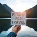 Soft focus hand holds paper, symbolizing plans for travel Royalty Free Stock Photo