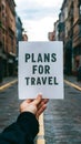 Soft focus hand holds paper, symbolizing plans for travel Royalty Free Stock Photo