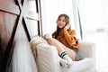 Soft Focus of Happy Young Woman Relaxing by Music Headphone Royalty Free Stock Photo