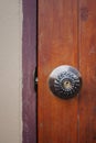 Soft focus metal door knob open house on a old wooden door, selective focus. Royalty Free Stock Photo