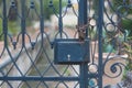 Soft focus of an old metal gate with a chain lock - a concept of security or privacy Royalty Free Stock Photo