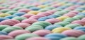 A soft focus perspective of rows of pastel colored easter eggs in a grid pattern Royalty Free Stock Photo