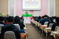 Soft focus photo of people participating conference listening to the speaker in conference room