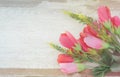 Soft focus of pink flowers bouquet on wood Royalty Free Stock Photo