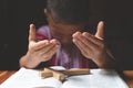 Soft focus on a Religious Christian Child  praying over Bible indoors, Religious concepts. prayer to god Royalty Free Stock Photo