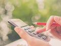 Soft focus retro woman hand working with calculator Royalty Free Stock Photo