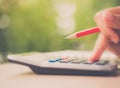 Soft focus retro woman hand working with calculator Royalty Free Stock Photo