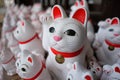 Soft focus shot of a dusty Japanese lucky money cat (Maneki-neko) Royalty Free Stock Photo