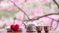 Soft Focus and Smooth Focus, a teapot and a set of ceramic crockery are placed on the table and there is a pink blurred background