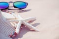 Soft focus on starfish. Beach accessories including sunglasses, Royalty Free Stock Photo