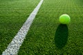 Soft focus of tennis ball on tennis grass court good for backgro Royalty Free Stock Photo