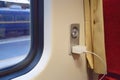 Soft focus to Reading light and AC power outlet 220V for passengers