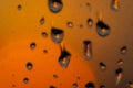 Soft focus water droplets on dirty glass a big drop close up and Macro on beautiful bokeh sunset sunrise background