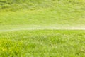 Soft focus watering drops spraying over the green golf course in Royalty Free Stock Photo