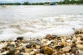 Soft focus of wave bubble on beach