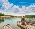 The soft focus the woman with the raft, the swamp, the mountain beautiful sky and cloud at Huai Krathing, Loei province, Thailand.