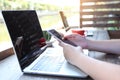 Soft focus of young woman of freelancer working using laptop computer in coffee shop, Communication technology and Business Royalty Free Stock Photo