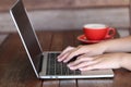 Soft focus of young woman of freelancer working using laptop computer in coffee shop, Communication technology and Business Royalty Free Stock Photo