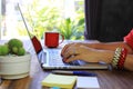 Soft focus of young woman of freelancer working using laptop computer in coffee shop, Communication technology and Business Royalty Free Stock Photo