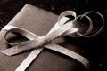 Soft focused gift on black shiny background.