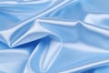 Soft folds and highlights of light blue silk. Royalty Free Stock Photo