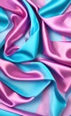 Soft folds on shiny fabric. Texture of pink and blue silk fabric. Light blue and pink silk satin fabric wave or silk wavy folds. Royalty Free Stock Photo