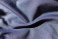 Soft folds of blue denim fabric Royalty Free Stock Photo