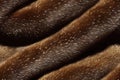 Soft furry decorative seamless pattern with wool texture. Design fragment of wavy fur fabric textile with fuzzy animal