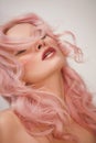 Soft-Girl Style with Trend Pink Flying Hair, Fashion Make-up. Blond Woman Face with Freckles, Blush Rouge, Rose Hair
