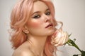 Soft-Girl Style with Trend Pink Flying Hair, Fashion Make-up. Blond Woman Face with Freckles, Blush Rouge, Rose Flowers