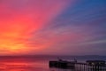 Soft Glowing Twilight, Sunrise Sky with Sea and Pier Royalty Free Stock Photo