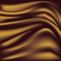 Soft golden silky fabric. Silk waves. Background. Royalty Free Stock Photo