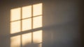 Soft Golden Window Light Grid Pattern Casting Shadows on a Wall image photo Royalty Free Stock Photo