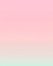 A soft gradient background transitioning from pink to light green with smooth color shift Royalty Free Stock Photo