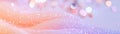 A soft gradient blends peach into lavender, creating a tranquil atmosphere. Fine glitter particles catch the light Royalty Free Stock Photo