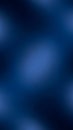 Soft gradient of deep blue with subtle light bokeh effect abstract background Royalty Free Stock Photo