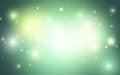 Soft Green Bokeh with Gentle Light Particles. Tranquil Blurred Background in Natural Tones