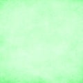 Soft green, subtle grunge paper texture background. Darkened edges. Royalty Free Stock Photo