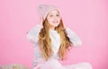 Soft knitted accessory. Tips for caring for knitted garments. Child long hair warm soft woolen hat enjoy softness. Kid