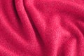 Soft knitted pink sweater texture closeup. Light orange abstract background Royalty Free Stock Photo