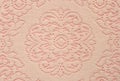 Soft lace doily on pink