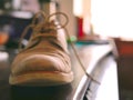 Soft Leather Oxford Shoe and Laces on Wooden Desk Mens Fashion Royalty Free Stock Photo