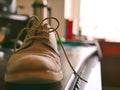 Soft Leather Oxford Shoes and Laces on Wooden Desk Mens Fashion Royalty Free Stock Photo