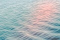 Soft light abstract background, water surface. Calm sea with beautiful sunlight reflections. Royalty Free Stock Photo