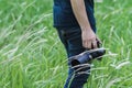 Soft Light and Blurred image, A photographer capturing the beautiful Grass flowers in the evening with a DSLR camera,