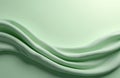 Soft light green fabric waves flow gently creating a smooth abstract background with subtle shadows. Minimalist design, peaceful Royalty Free Stock Photo