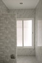 Soft light in new restroom decoration with modern ceramic. frosted glass window in toilet