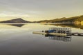 Soft Light Sunrise Glow on a Mountain Lake Boating Dock