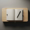 Soft lighting creates gentle shadows on the table and notebook, adding depth Royalty Free Stock Photo